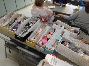 Club members frequently bring in dolls to sell